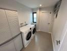 Modern laundry room with washer and dryer