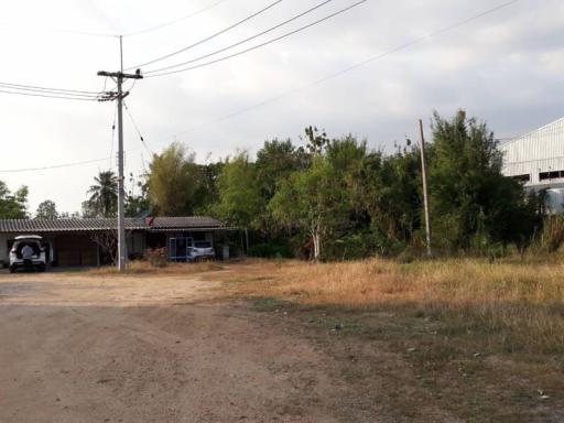Rural house exterior with land and vegetation