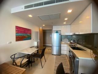 Modern open-plan kitchen and dining area in an apartment