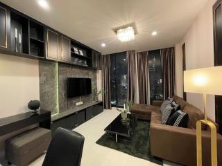 Modern living room interior at night with city view