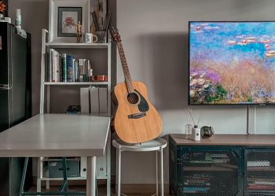 Cozy living room with modern furniture and mounted television