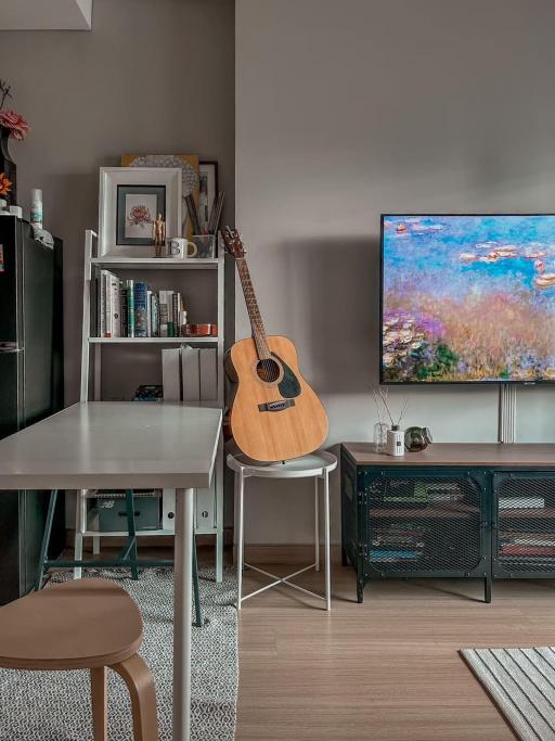 Cozy living room with modern furniture and mounted television