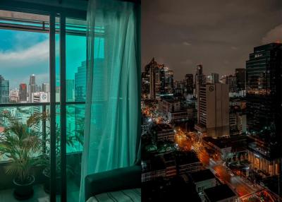 City view from a high-rise building with day and night contrast