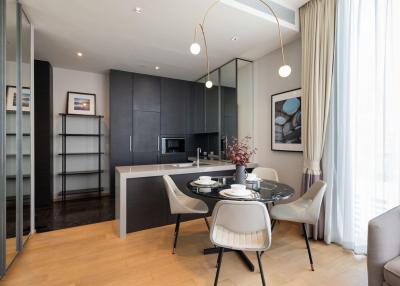 Modern kitchen with dining area and natural light