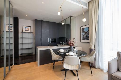 Modern kitchen with dining area and natural light