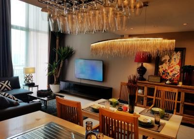 Elegant living room with modern decor and abundant natural light