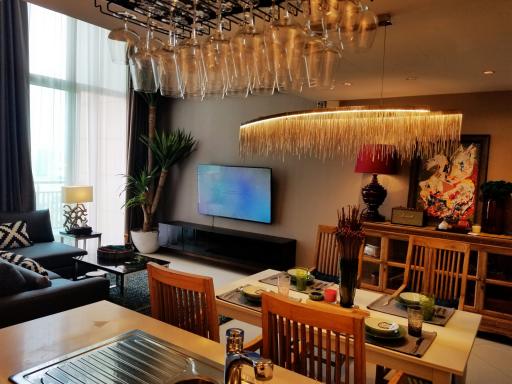 Elegant living room with modern decor and abundant natural light