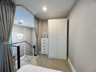 Cozy modern bedroom with elegant furnishings