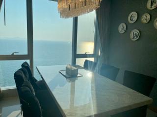 Dining room with sea view and sunlight