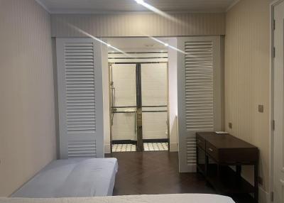 Modern bedroom with en-suite bathroom and minimalistic furniture