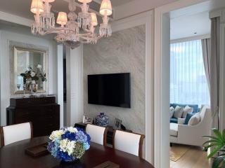 Elegant living room with chandelier and modern amenities