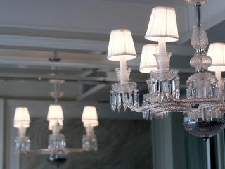 Elegant chandelier lighting in a modern living room interior