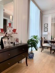Elegant living room with natural light and tasteful decorations