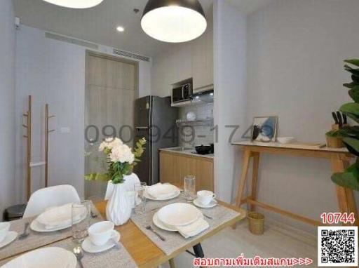 Modern kitchen with dining area in a new apartment