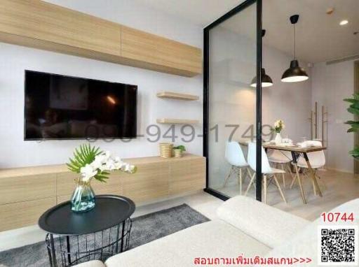 Modern living room with dining area and decorative elements