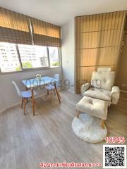 Cozy furnished living room with natural light