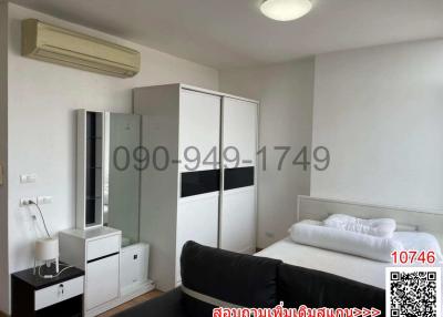 Modern minimalist bedroom interior with white furniture
