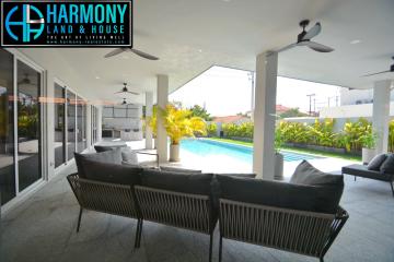 Spacious patio area with pool and outdoor seating
