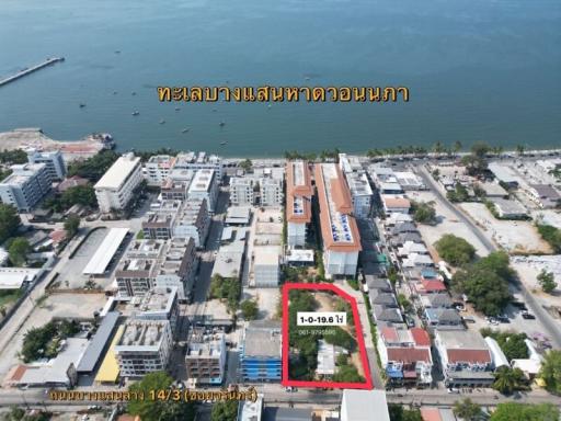 Aerial view of urban coastline with buildings