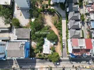 Aerial view of a property with potential for development surrounded by buildings and houses