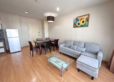 Modern living room with furniture and wood flooring