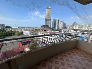 Spacious balcony with urban view and safety netting