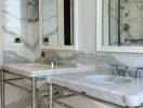 Elegant bathroom with marble details and glass shower enclosure