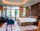 Spacious bedroom with modern furniture and ample light