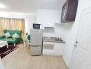 Compact and fully equipped kitchen with integrated living space