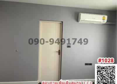 Minimalist room interior with air conditioning unit