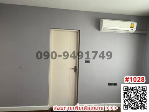 Minimalist room interior with air conditioning unit