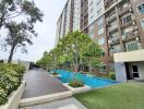 Outdoor common area with swimming pool at a residential building