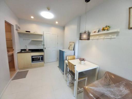 Modern kitchen with an open plan dining area in a new apartment