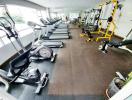 Modern gym with various exercise equipment