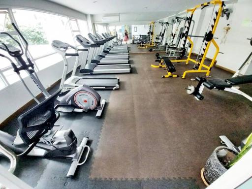 Modern gym with various exercise equipment