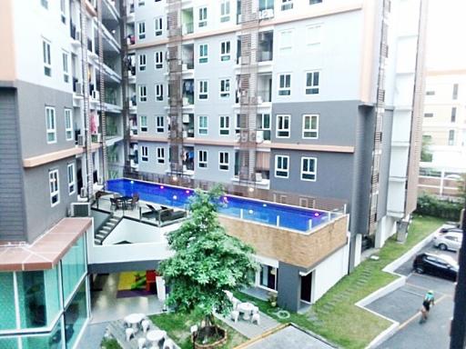 Modern apartment building with pool and communal areas