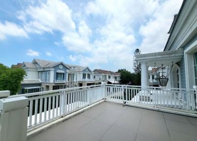 Spacious balcony with a view of residential neighborhood