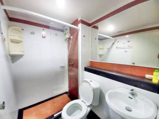 Modern bathroom interior with shower cabin and vanity