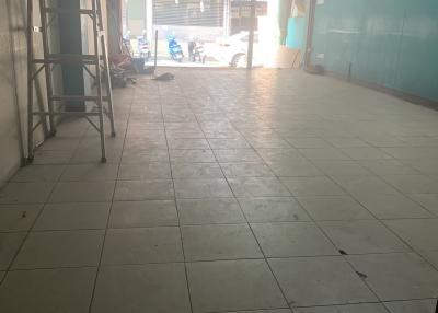 Empty commercial space with tiled flooring