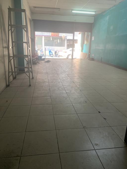 Empty commercial space with tiled flooring