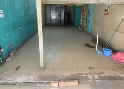 Spacious unfurnished interior of a commercial building entrance with tiled floors