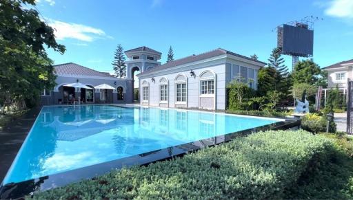 Luxurious house with a large swimming pool and landscaped garden