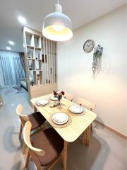 Modern dining area with set table and contemporary decor