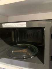 Microwave oven interior with a glass tray