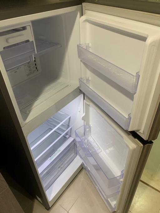 Open empty fridge in a modern kitchen