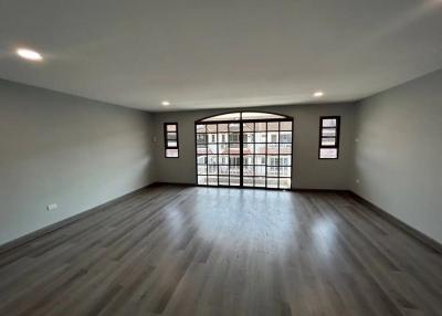 Spacious living room with large glass window