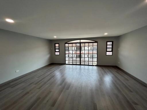 Spacious living room with large glass window