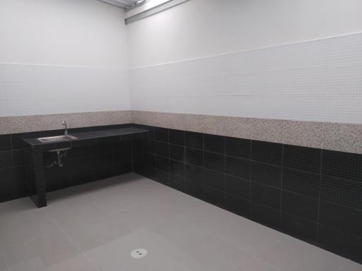 Modern bathroom with black and white tiling