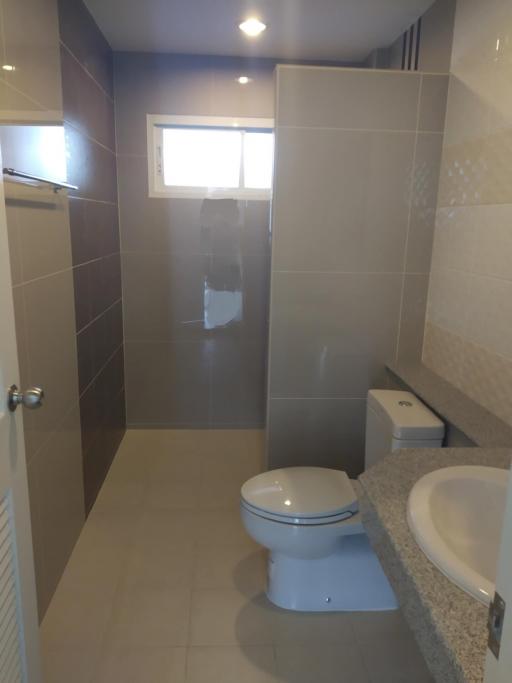 Modern bathroom interior with toilet and shower