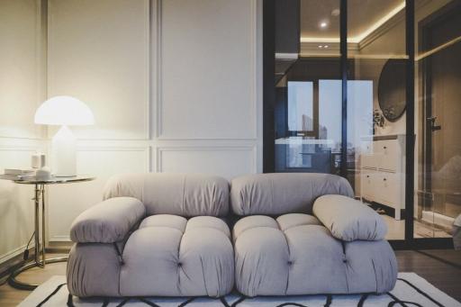 Modern living room with plush sofa and elegant interior design